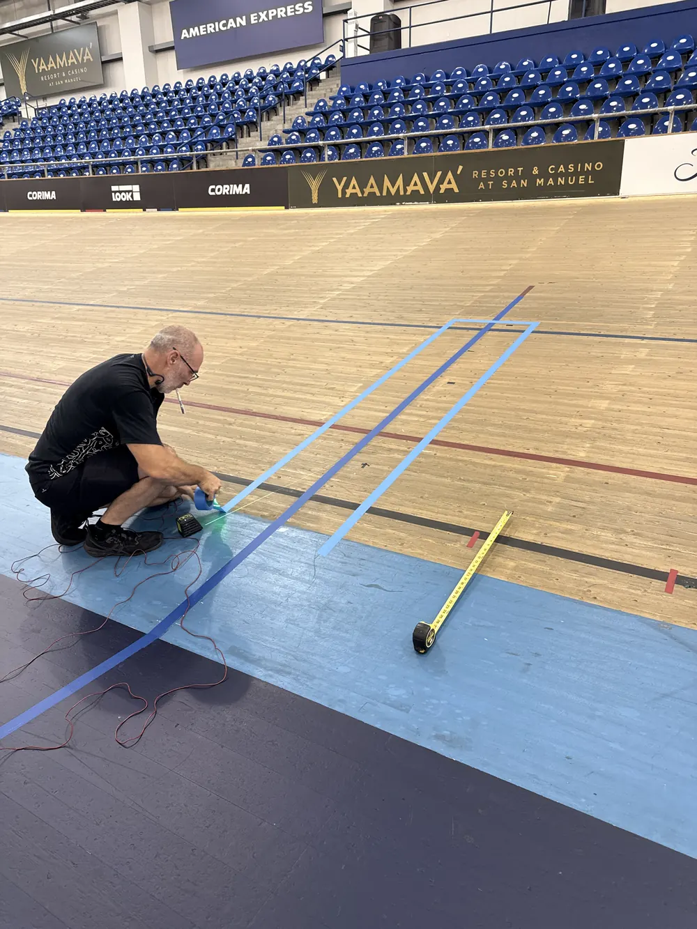 Jamie Staff, MBE, taping a temporary timing loop across the track at Carson.